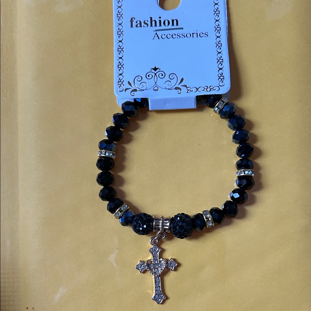Elegant Black Beaded Bracelet with Cross Charm